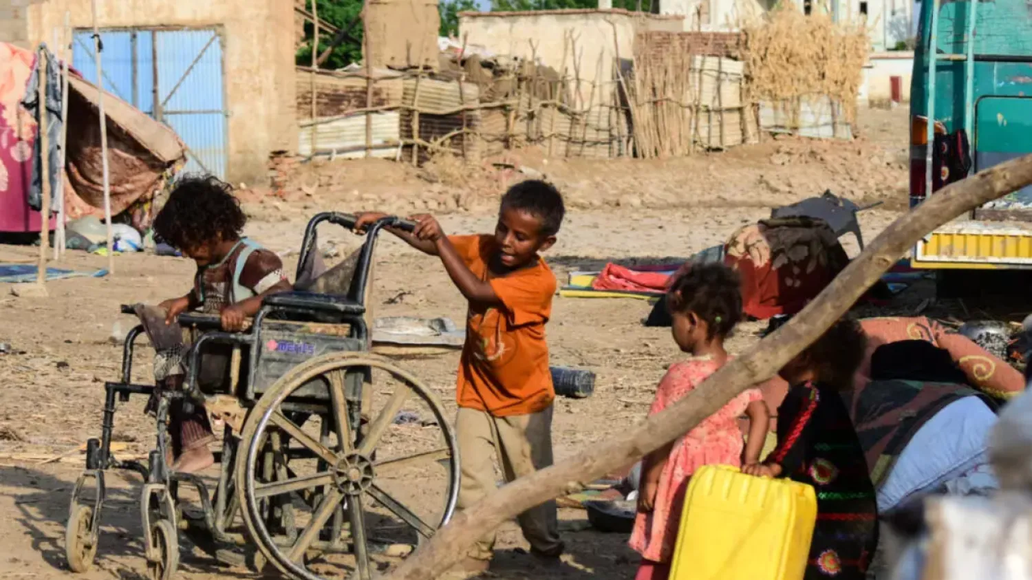 Sudanese children play on a street in Tokar, in Red Sea State, following heavy flooding in October, 2024 © AFP/File
