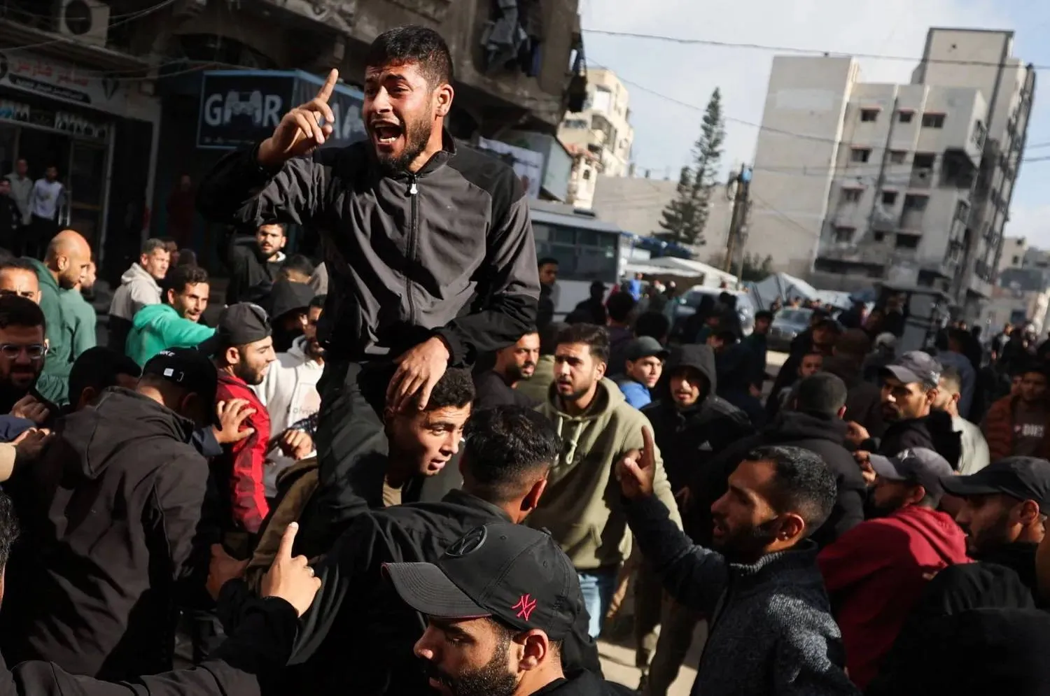 Palestinians mourn victims of Israeli strikes in Gaza City, Tuesday (Reuters)