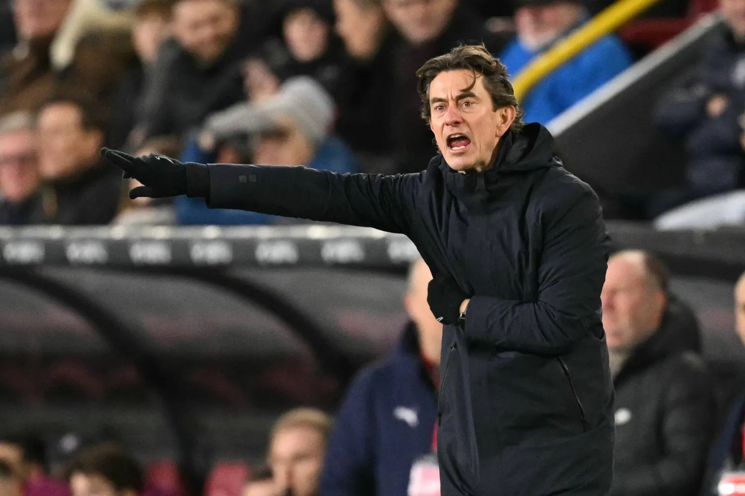 (FILES) Tottenham Hotspur's Danish head coach Thomas Frank gestures on the touchline during the English Premier League football match between Burnley and Tottenham Hotspur at Turf Moor in Burnley, north-west England on January 24, 2026. (Photo by Oli SCARFF / AFP)/ 