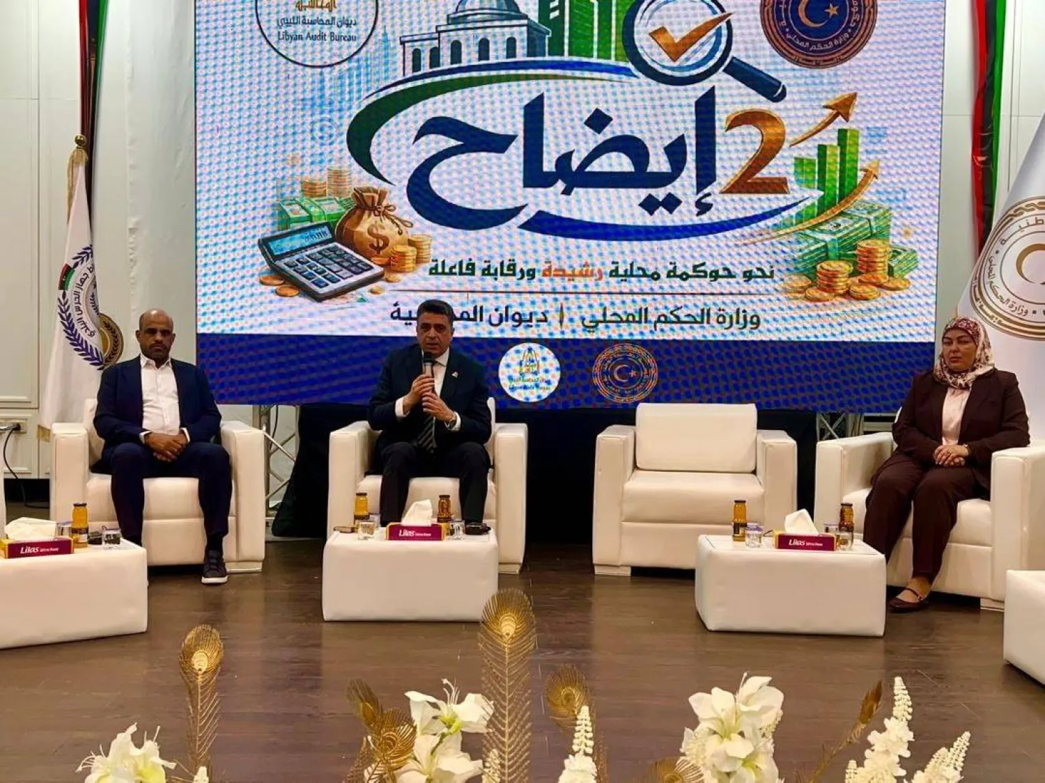 رئيس جهاز ديوان المحاسبة الليبي خالد شكشك متحدثاً خلال ملتقى في مدينة جنزور الأربعاء (إدارة الإعلام بالحرس البلدي)