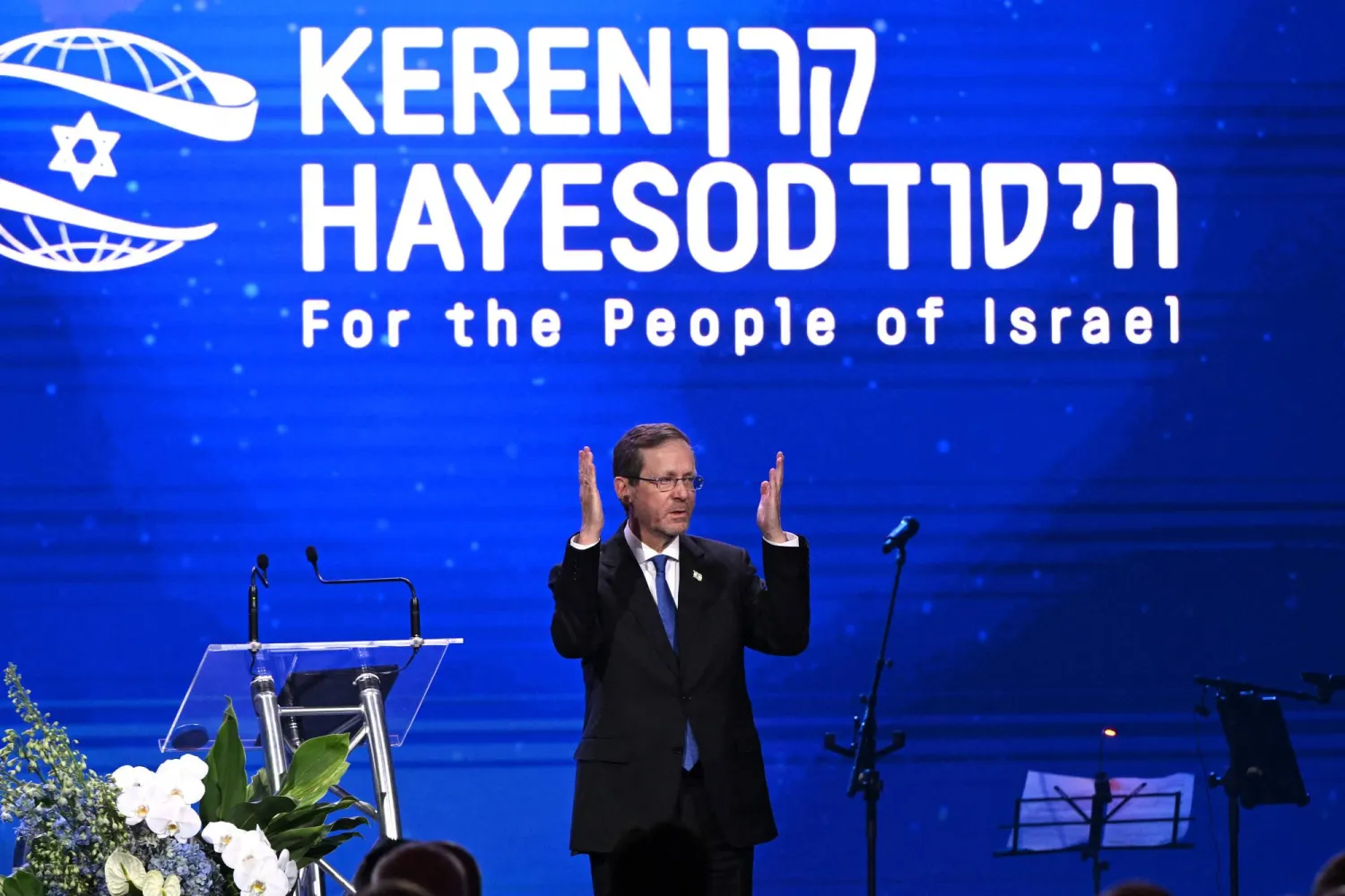 Israel's President Isaac Herzog reacts during a Jewish community event in Melbourne on February 12, 2026. (Photo by WILLIAM WEST / AFP)