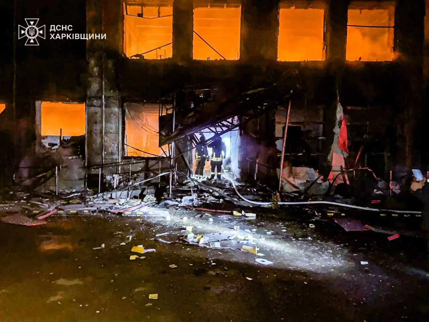 In this photo provided by the Ukrainian Emergency Service, emergency services personnel work to extinguish a fire at a house following a Russian air attack in Barvinkove, Kharkiv region, Ukraine, Wednesday, Feb. 11, 2026. (Ukrainian Emergency Service via AP)