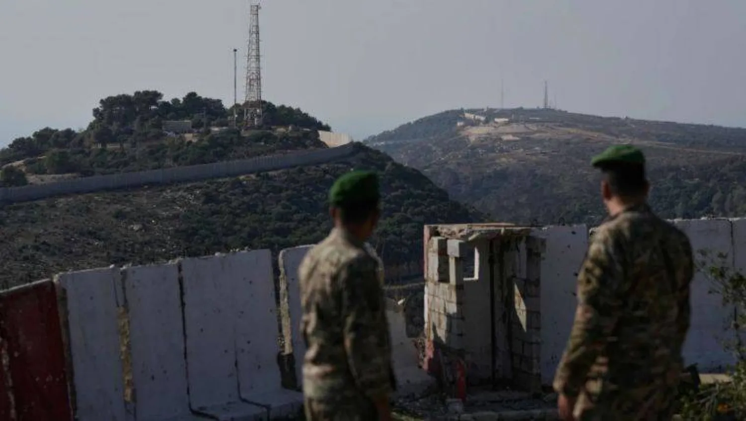 Two Lebanese army soldiers at a military border post with Israel in the village of Alma El Chaab in southern Lebanon (Archive - AP)