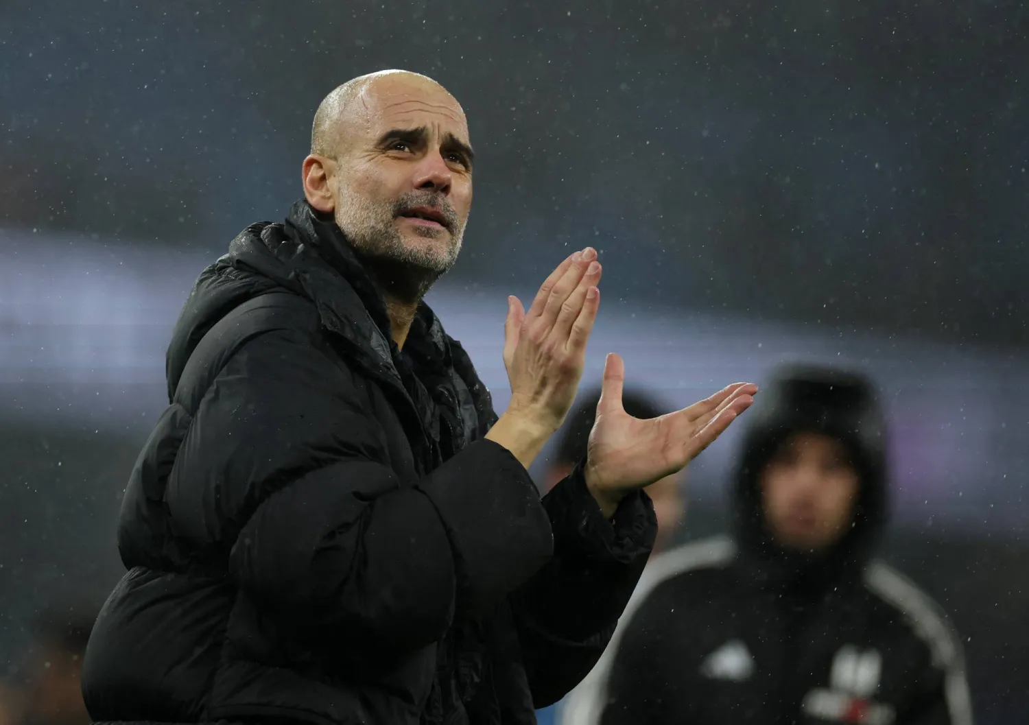 Football - Premier League - Manchester City v Fulham - Etihad Stadium, Manchester, Britain - February 11, 2026 Manchester City manager Pep Guardiola applauds fans after the match. (Reuters)