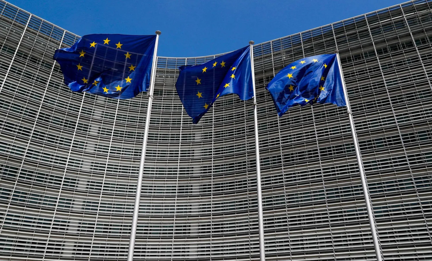 FILE PHOTO: European Union flags flutter outside the EU Commission headquarters in Brussels, Belgium June 20, 2018. REUTERS/Yves Herman/File Photo