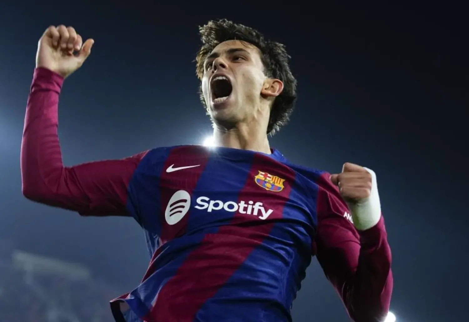 FC Barcelona's striker Joao Felix celebrates after scoring the 2-1 goal during the UEFA Champions League group H soccer match between FC Barcelona and FC Porto, in Barcelona, Spain, 28 November 2023. (EPA)
