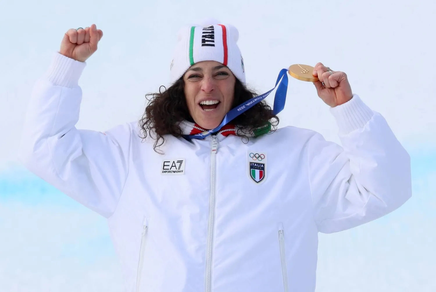 Gold medalist Federica Brignone of Italy celebrates during the medal ceremony of the Women's Super G of the Alpine Skiing competitions at the Milano Cortina 2026 Winter Olympic Games, Tofane ski center in Cortina d'Ampezzo, Italy, 12 February 2026. (EPA)