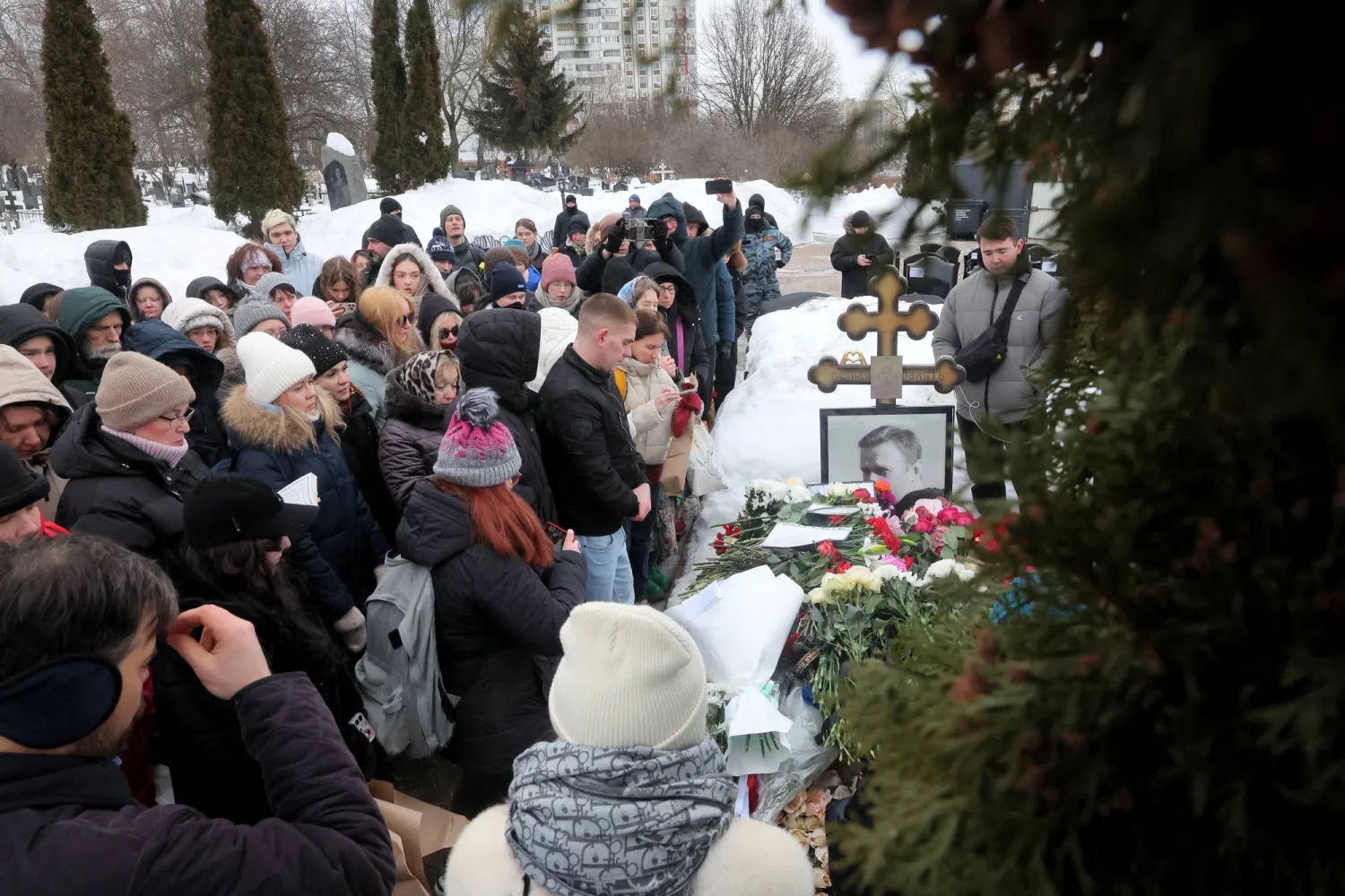 People queue to visit the grave of Alexei Navalny, the late Russian opposition leader, on the second anniversary of his death, at the Borisovskoye Cemetery in Moscow, Russia, 16 February 2026. EPA/MAXIM SHIPENKOV