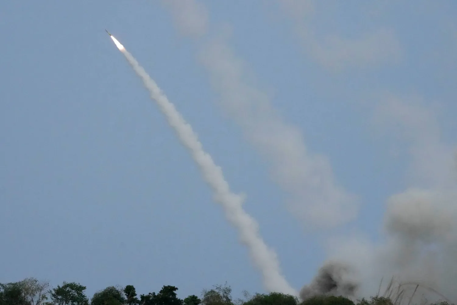 A US M142 High Mobility Artillery Rocket System (HIMARS) fires a missile during a Combined Joint Littoral Live Fire Exercise at the joint military exercise called "Balikatan", Tagalog for shoulder-to-shoulder in a Naval station in Zambales province, northern Philippines on Wednesday, April 26, 2023. (AP)
