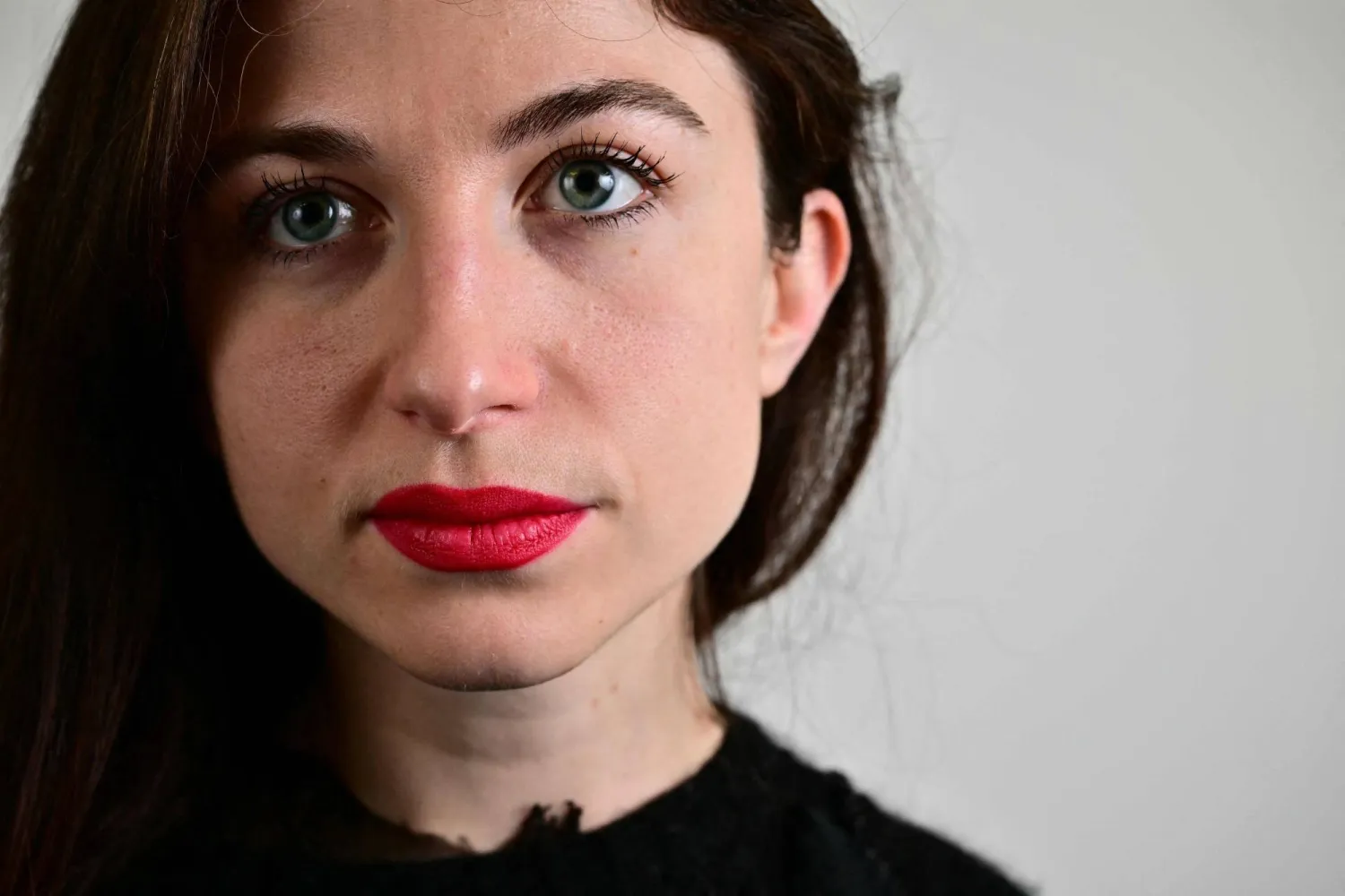 This photo taken on February 6, 2026 shows French fashion designer Pauline Dujancourt posing for a photograph in her studio in south London. (Photo by Ben STANSALL / AFP) 