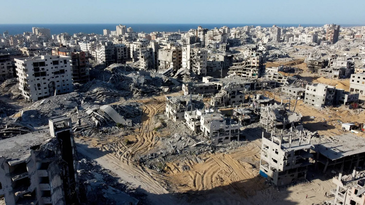 A drone view shows the destruction in a residential neighborhood, after the withdrawal of the Israeli forces from the area, amid a ceasefire between Israel and Hamas in Gaza, in Gaza City, October 21, 2025. (Reuters)