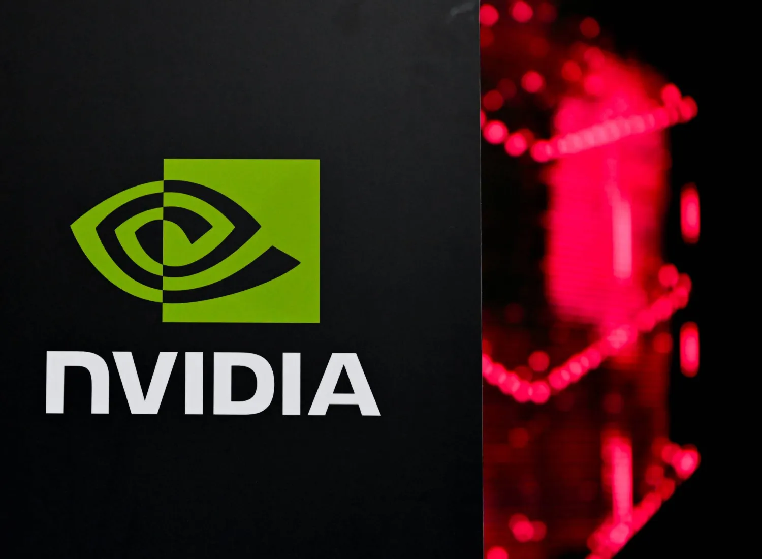 FILED - 04 February 2026, Bavaria, Munich: The NVIDIA logo is seen during a press conference at the opening of Telekom and NVIDIA's AI factory "Industrial AI Cloud". Photo: Sven Hoppe/dpa