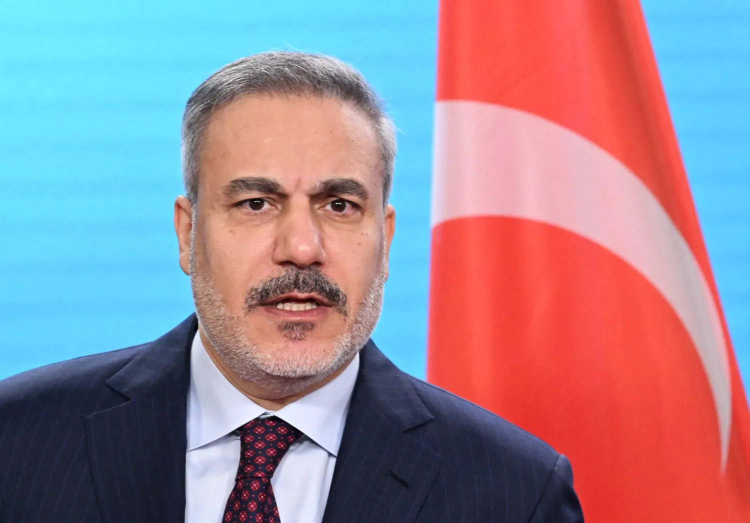 28 November 2025, Berlin: Turkish Foreign Minister Hakan Fidan during a joint press conference with German Foreign Minister Wadephul. (dpa)