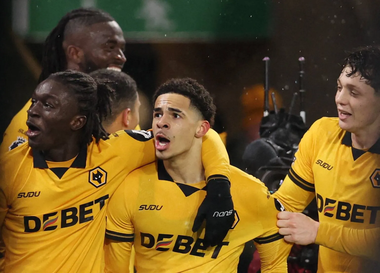 Soccer Football - Premier League - Wolverhampton Wanderers v Arsenal - Molineux Stadium, Wolverhampton, Britain - February 18, 2026  Wolverhampton Wanderers' Tom Edozie celebrates scoring their second goal with teammates REUTERS/Chris Radburn 