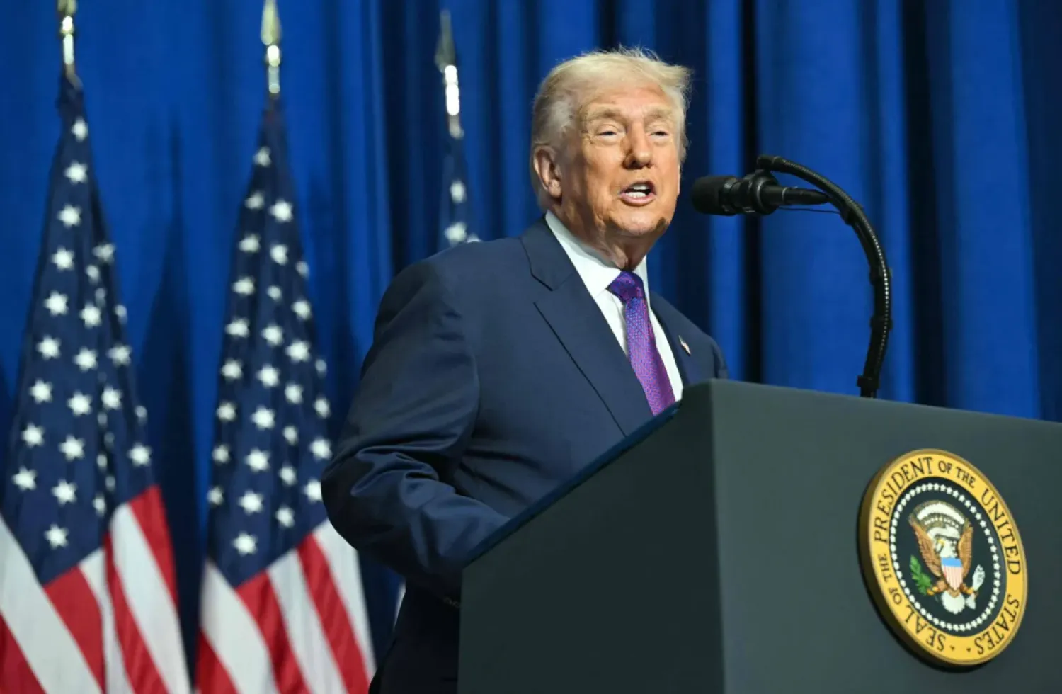 US President Donald Trump speaking in Washington - AFP