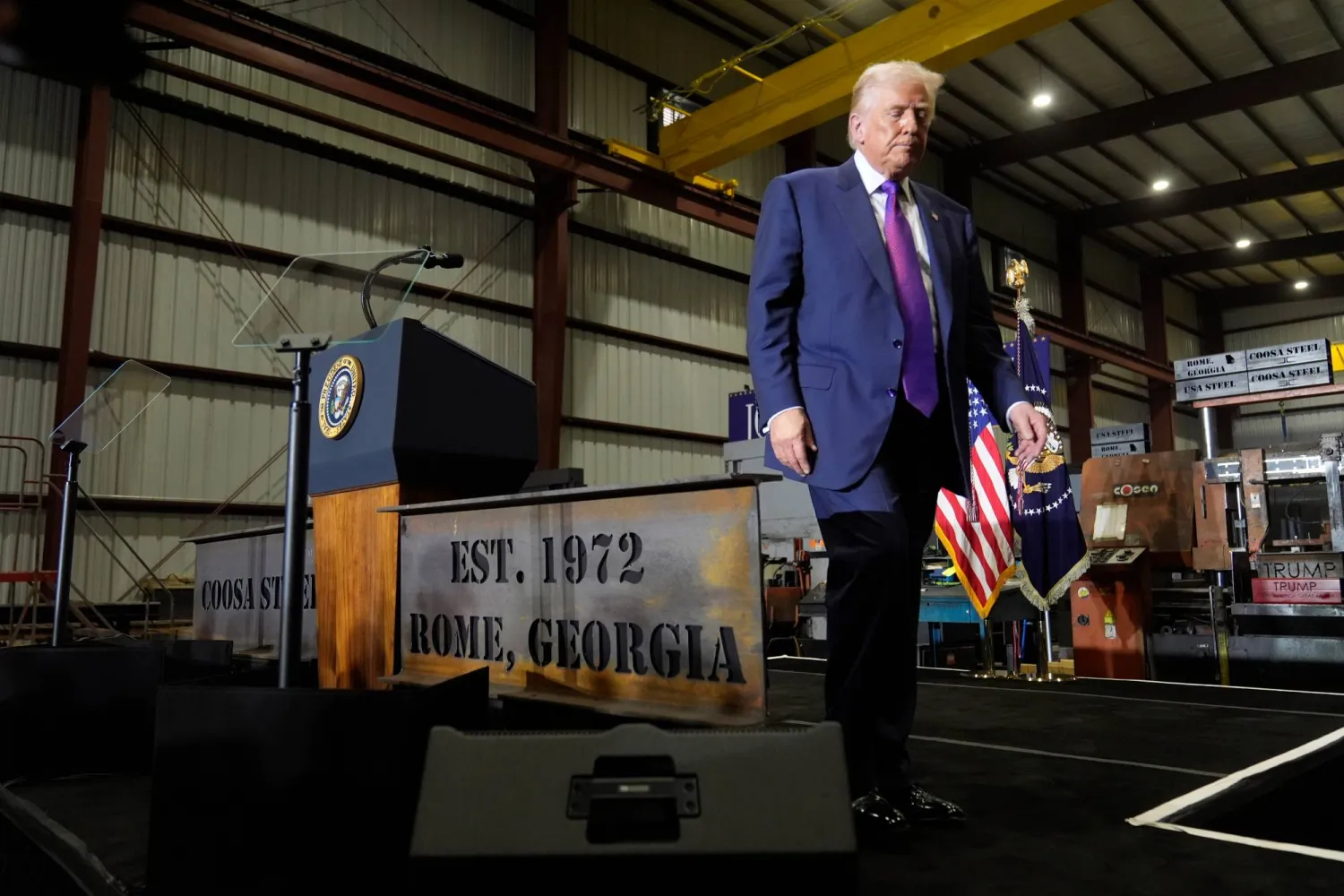 President Donald Trump gets ready to exit the stage after speaking at a rally at Coosa Steel Corporation in Rome, Ga., Thursday, Feb. 19, 2026. (AP Photo/Mark Schiefelbein)