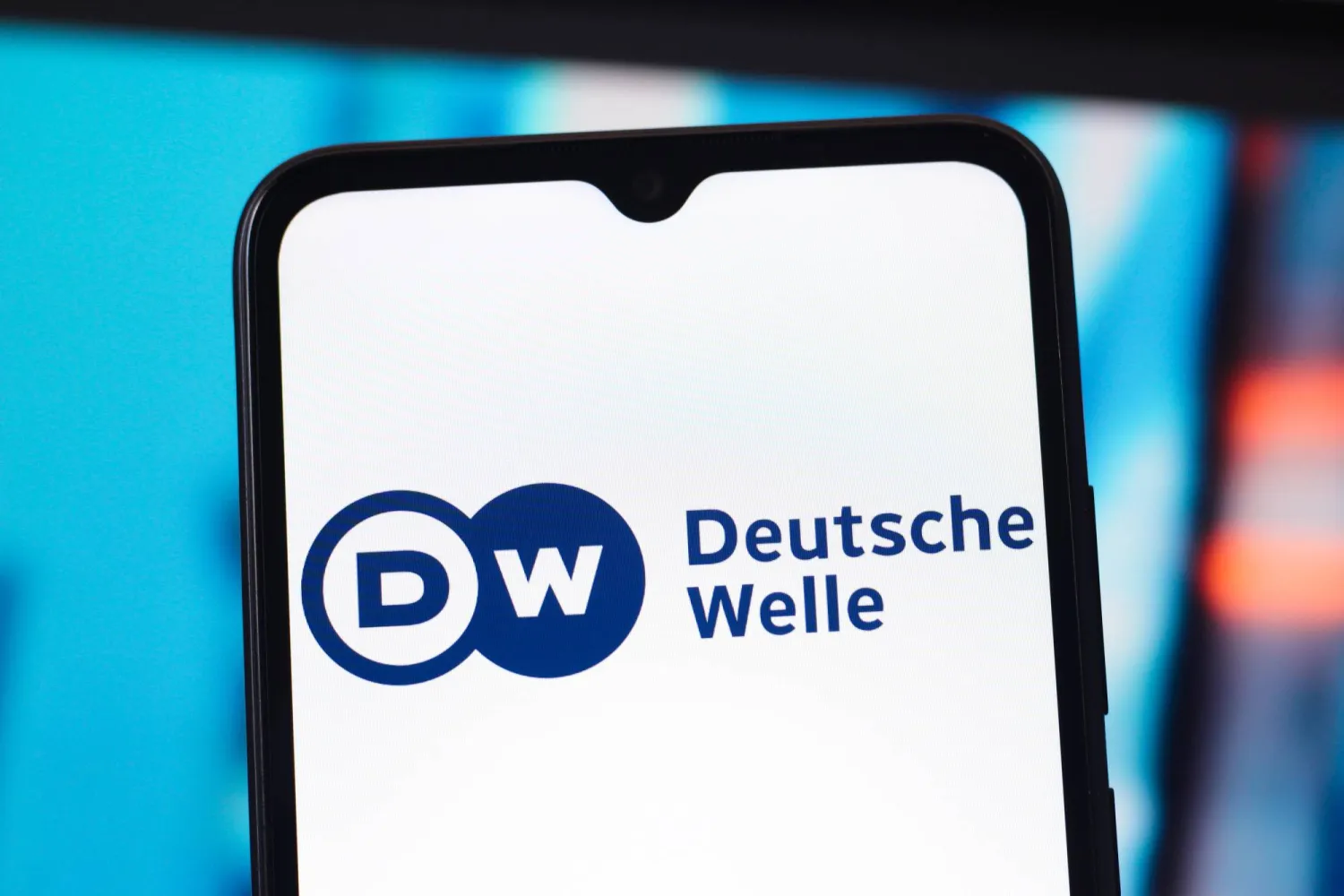 19 February 2026, Canada: Deutsche Welle (DW) logo is seen displayed on a smartphone screen. Photo: Thomas Fuller/SOPA Images via ZUMA Press Wire/dpa