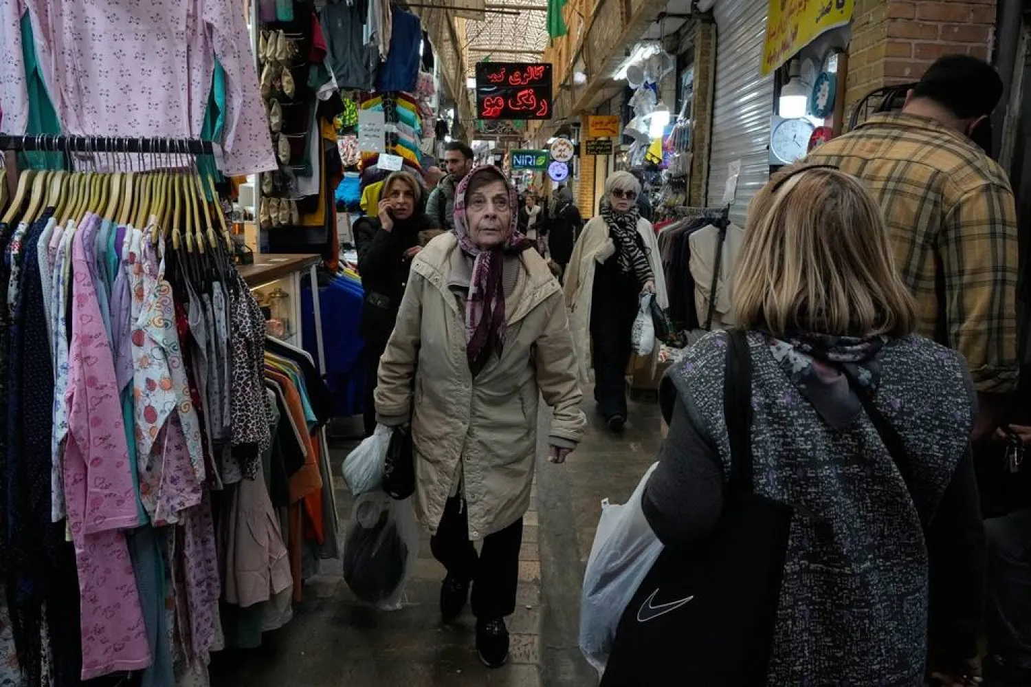  People walk at Tajrish traditional bazaar in northern Tehran, Iran, Thursday, Feb. 19, 2026. (AP) 