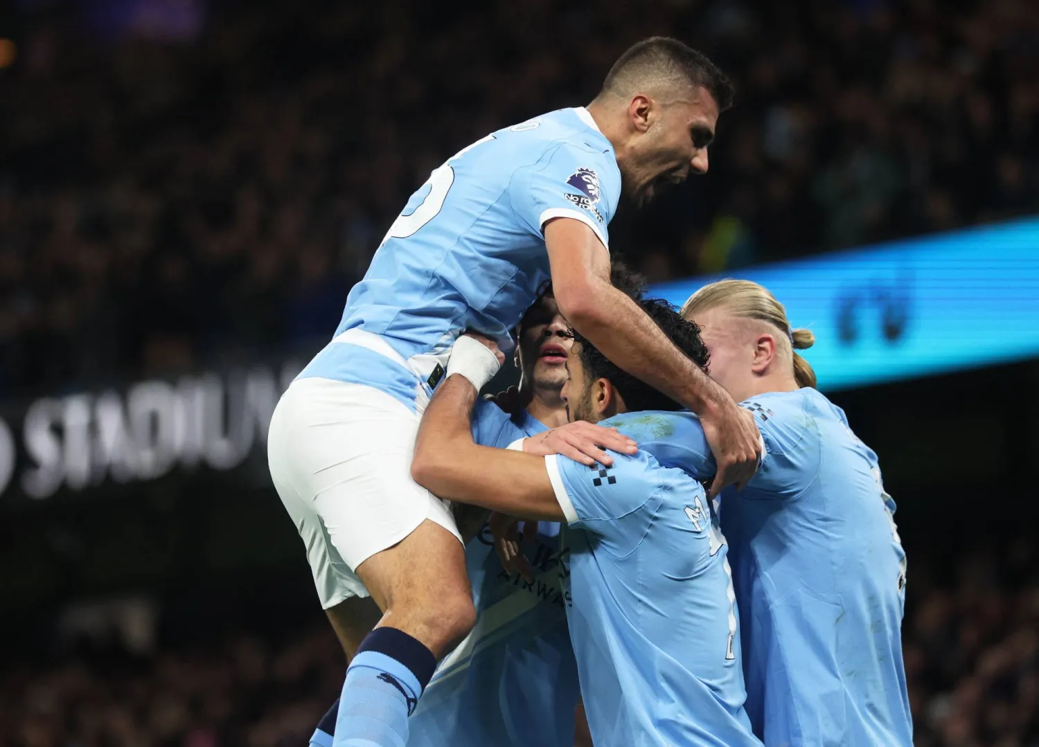 Manchester City players celebrate the second goal (EPA)