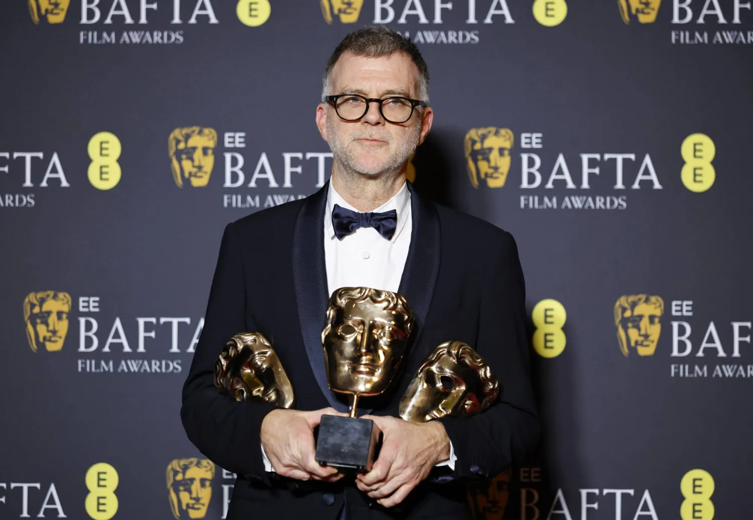 Director Paul Thomas Anderson poses in the press room after winning the awards for Best Film, Best Adapted Screenplay, and Best Director for "One Battle After Another" during the EE BAFTA Film Awards 2026 at the Royal Festival Hall in London, Britain, 22 February 2026. (EPA)