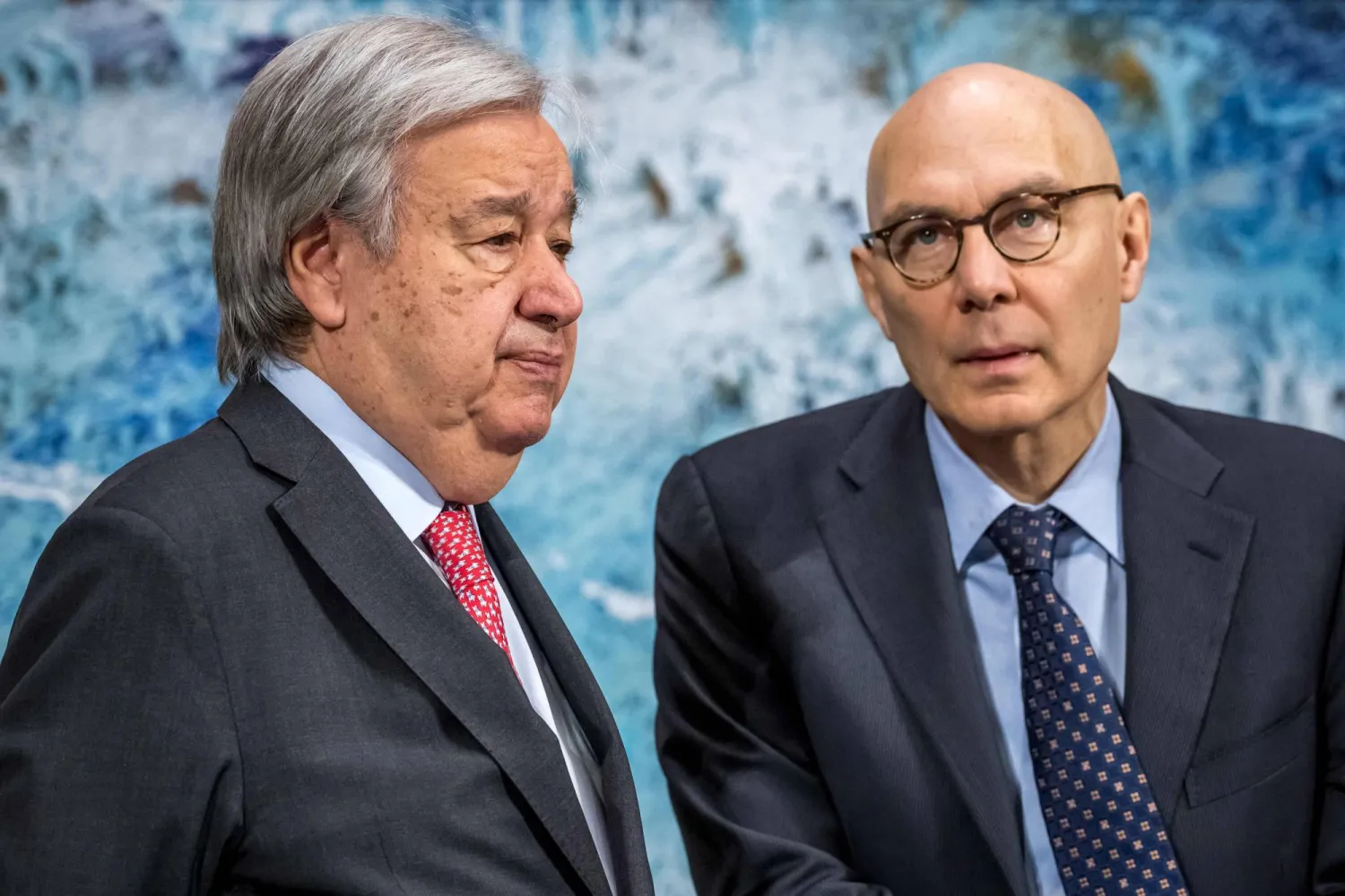 UN Secretary-General Antonio Guterres (L) stands next to UN High Commissioner for Human Rights Volker Turk at the opening of the 61st session of the UN Human Rights Council at the United Nations office in Geneva on February 23, 2026. (AFP) 