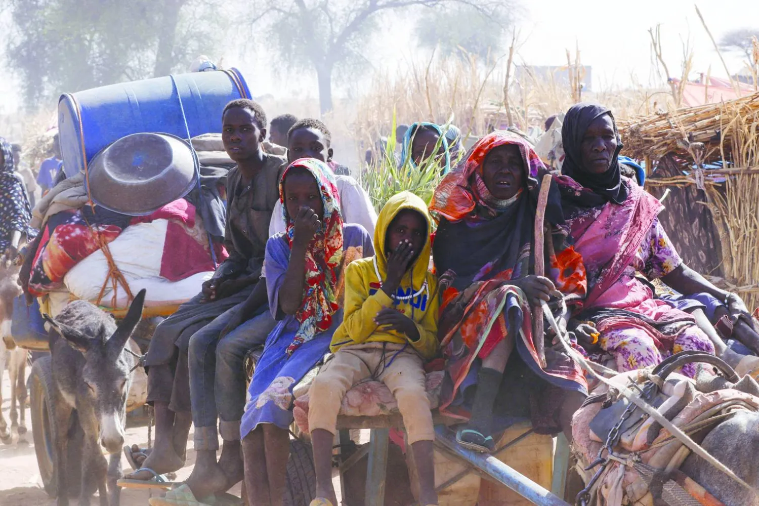 FILE PHOTO: Displaced people ride a an animal-drawn cart, following Rapid Support Forces (RSF) attacks on Zamzam displacement camp, in the town of Tawila, North Darfur, Sudan April 15, 2025. REUTERS/Stringer/File Photo