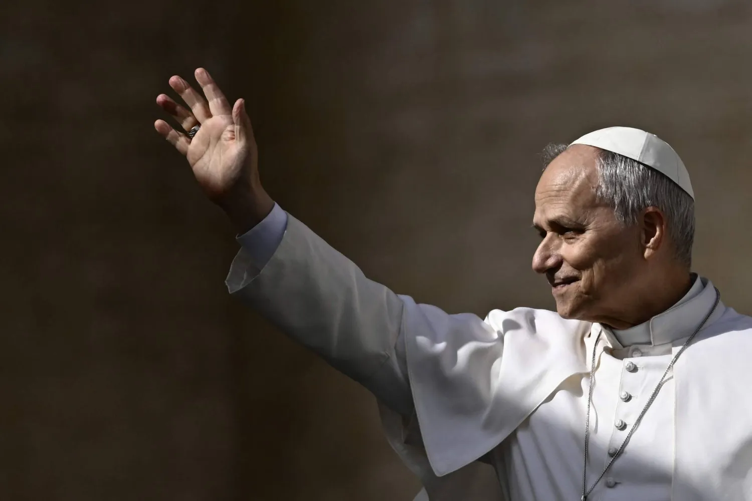 Pope Leo XIV waves to the crowd during the weekly general audience at St Peter's Square in The Vatican on February 18, 2026. (AFP)