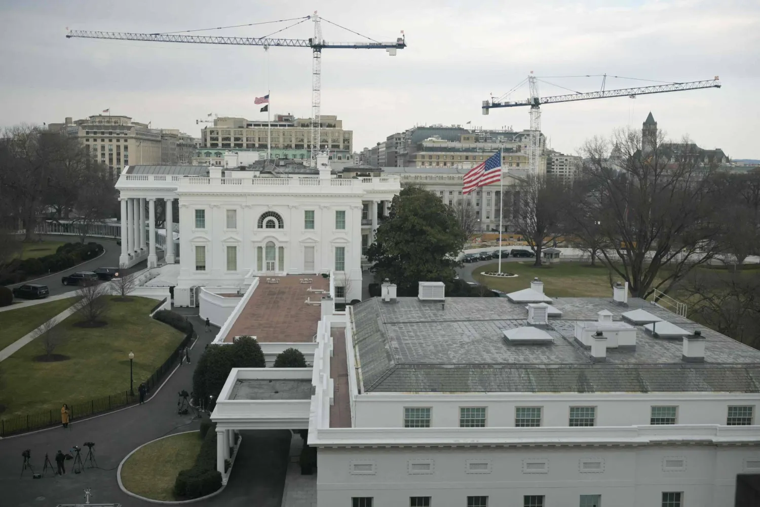 Cranes are seen on the grounds of the White House as construction work continues for US President Donald Trump's new ballroom in Washington, DC, on February 25, 2026. (Photo by Oliver Contreras / AFP)