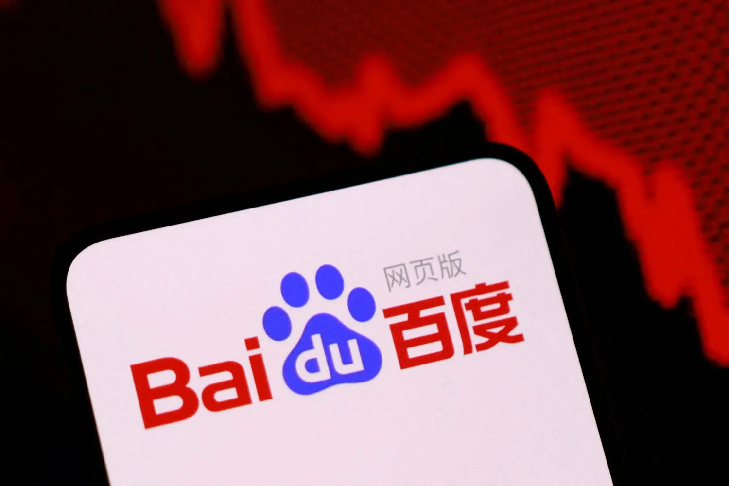 FILE PHOTO: A Baidu logo and a decreasing stock graph appear in this illustration taken August 18, 2025. REUTERS/Dado Ruvic/Illustration/File Photo