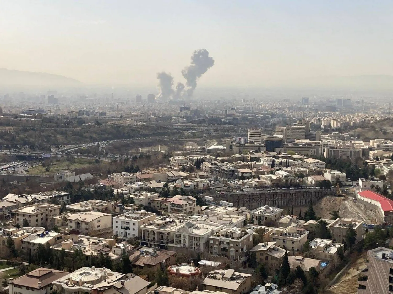28 February 2026, Iran, Tehran: Smoke billows following an explosion in Tehran. Photo: Tasnim News Agency/ZUMA Press Wire/dpa