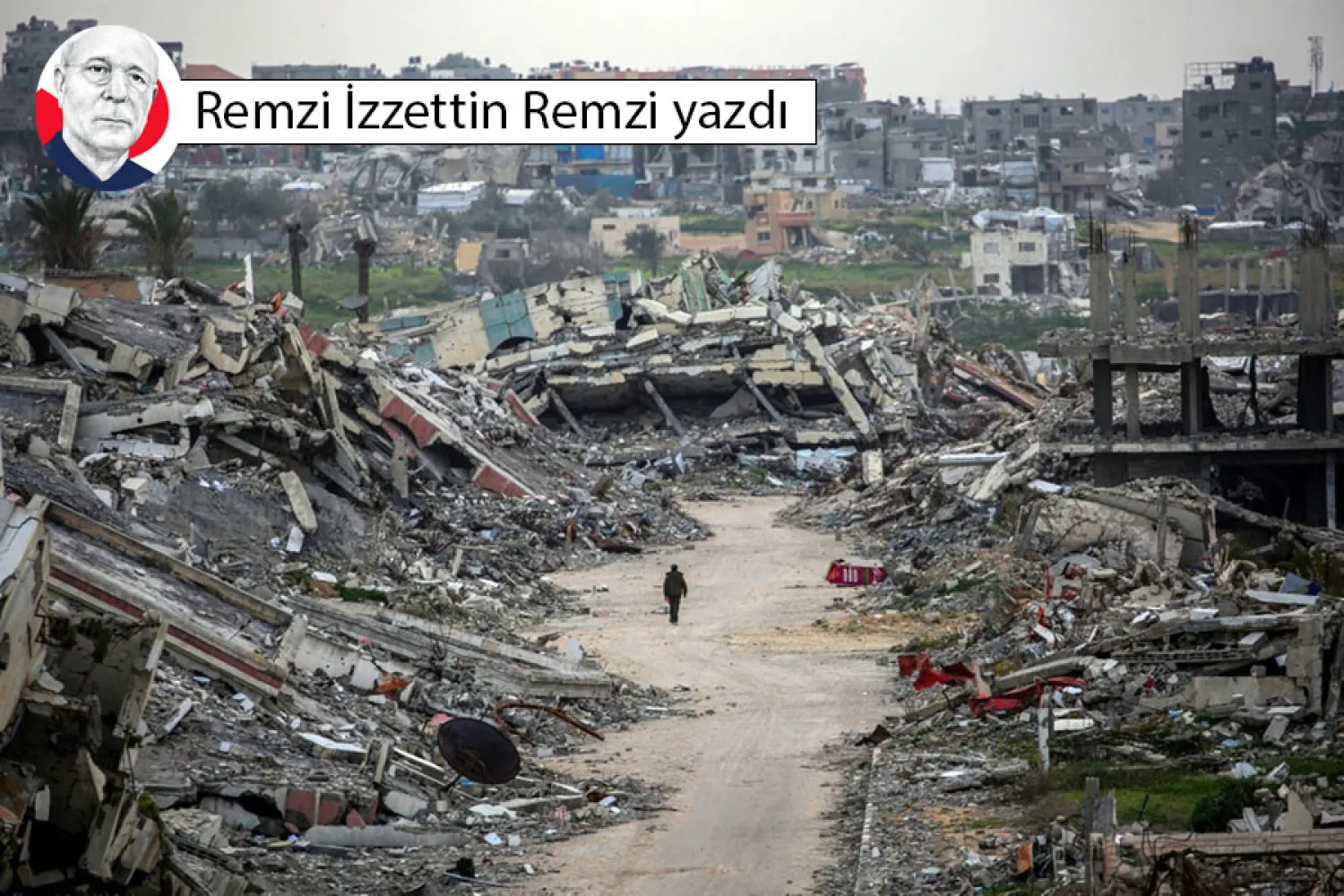 Gazze Şeridi'nin merkezindeki Nuseyrat Mülteci Kampı’nın güneybatısındaki ez-Zehra Mahallesi’nde yıkılmış binaların kalıntıları, 6 Şubat 2026 (AFP)