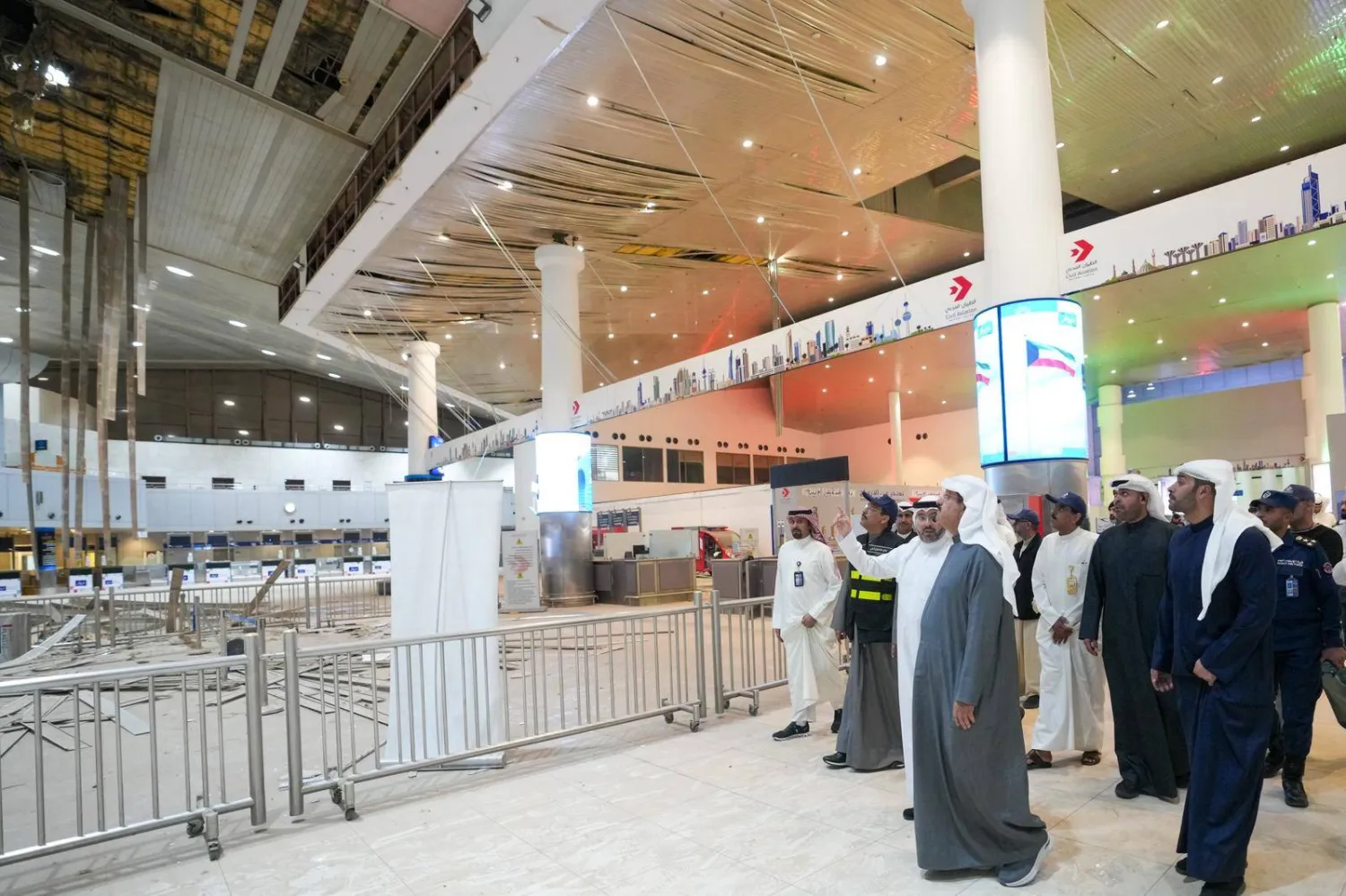 Prime Minister Sheikh Ahmed Al-Abdullah inspects the procedures for dealing with the damage at Kuwait International Airport (KUNA)