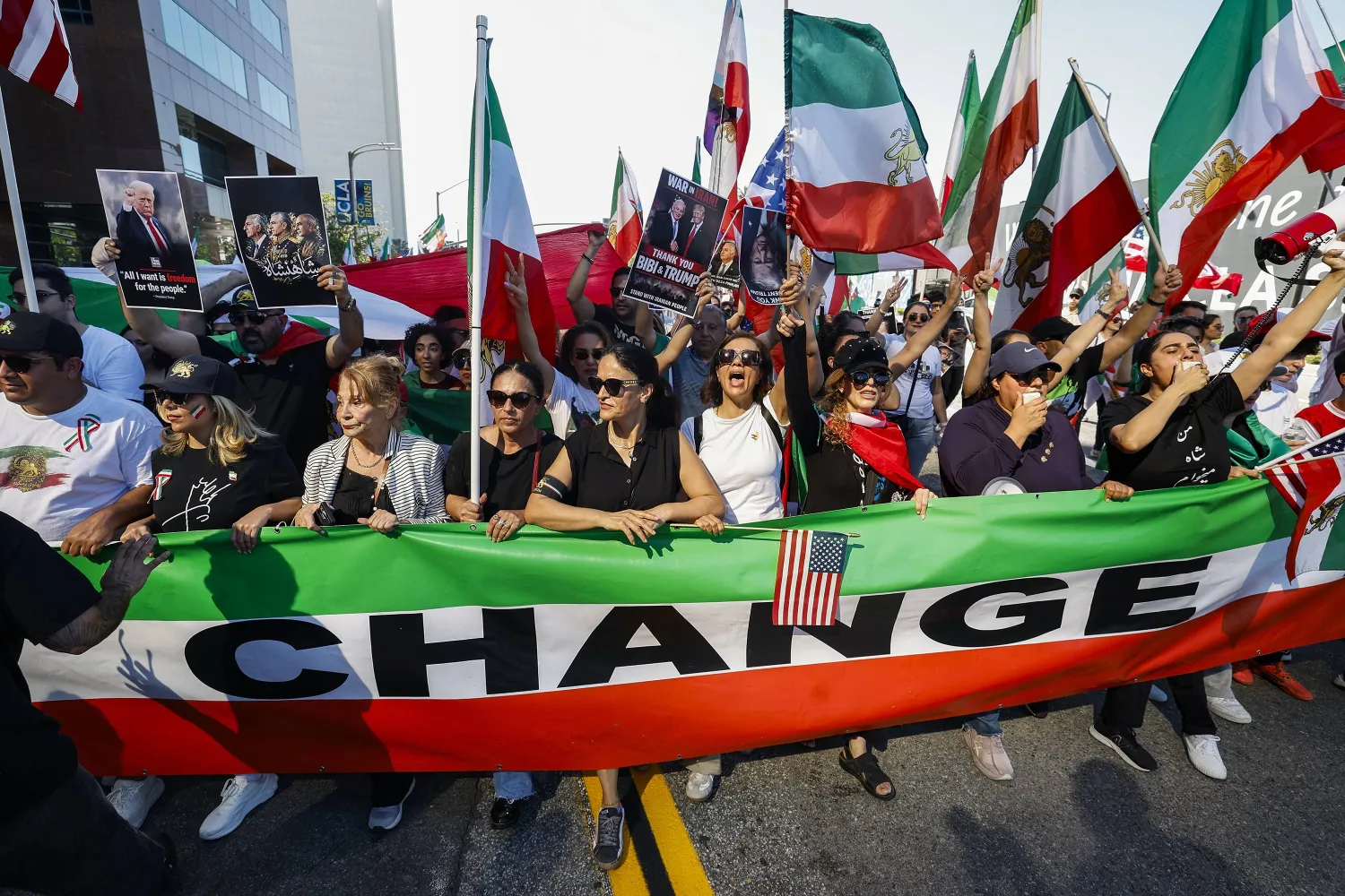 Demonstrators wave flags and march in celebration following the US and Israeli strikes in Iran; in Los Angeles, California, USA, 28 February 2026. (EPA)