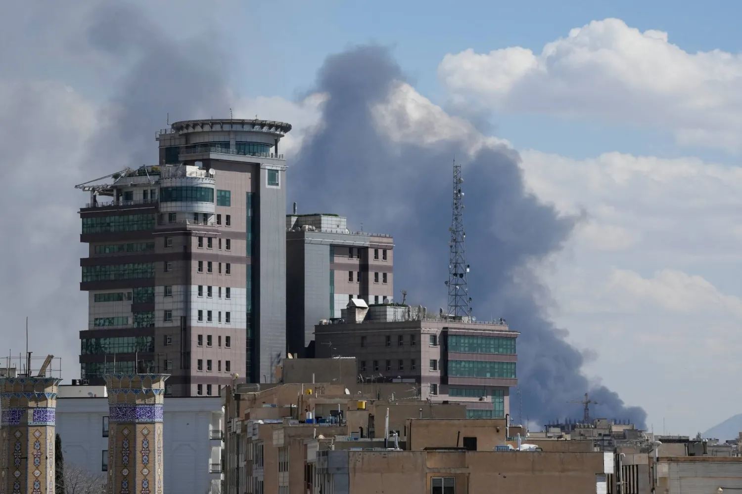  Smoke rises up after a strike in Tehran, Iran, Sunday, March 1, 2026. (AP) 