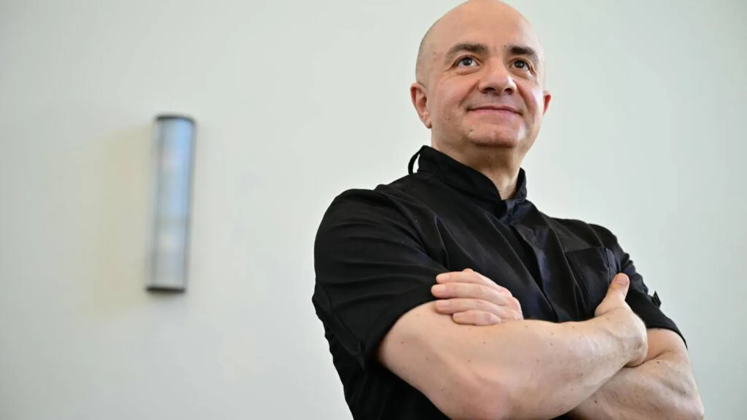 Imad Alarnab, a chef and restaurant owner who fled Syria in 2015, hosted King Charles III at his Soho restaurant. Ben STANSALL / AFP
