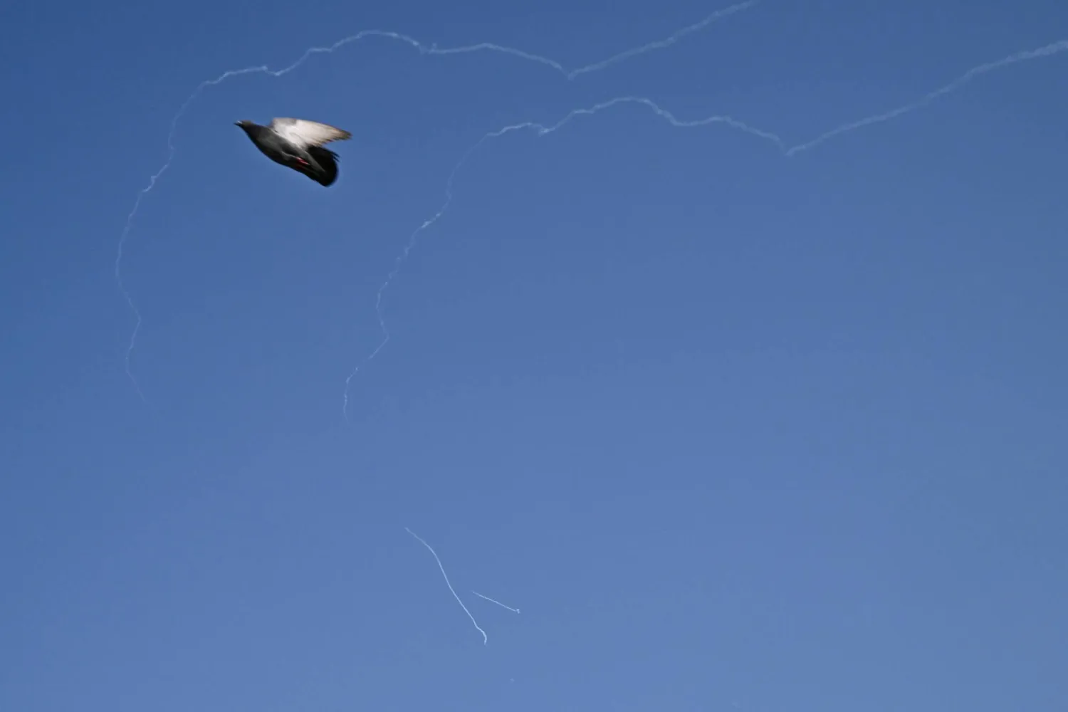 The effects of intercepting an Iranian missile in the skies of Dubai (AFP)