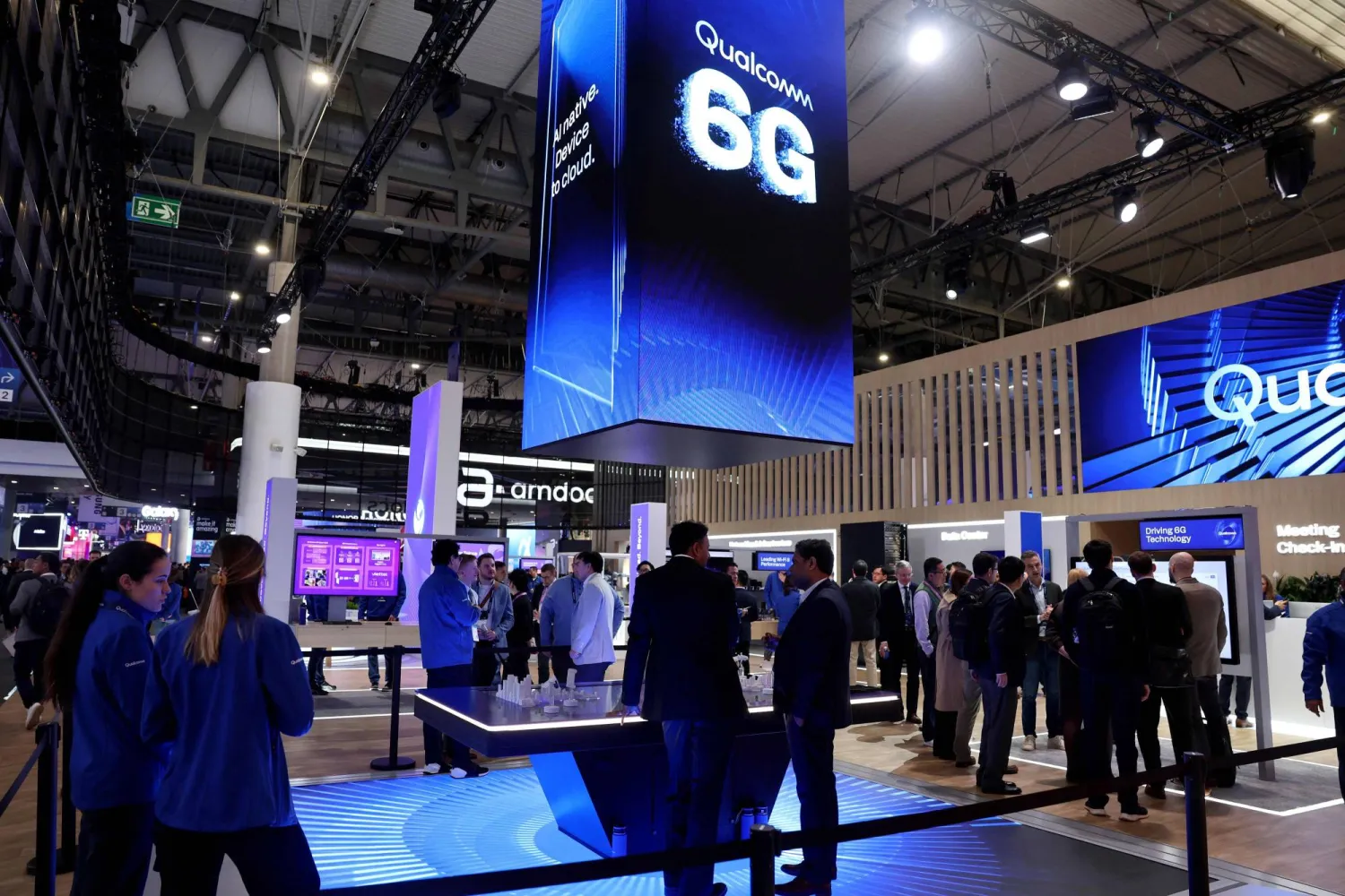 A picture taken on March 2, 2026 in Barcelona shows Qualcomm's stand adverstising 6G technology during the inauguration of the Mobile World Congress (MWC), the world's biggest mobile technology showcase and fair. (Photo by Josep LAGO / AFP)