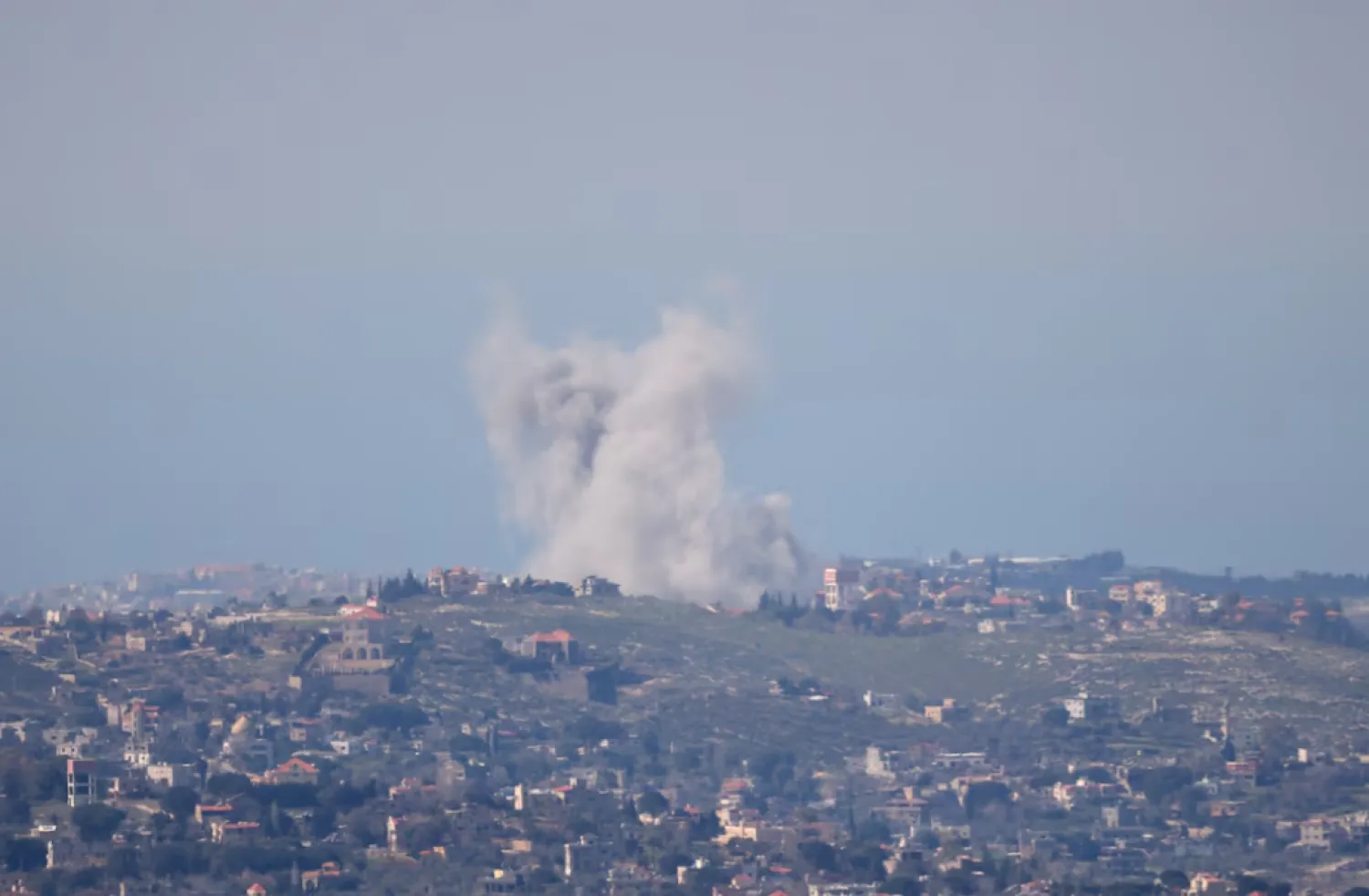 Smoke and dust rise amid explosions in Lebanon, as seen from Israel, after Lebanon's Iran-backed Hezbollah and Israel exchanged fire amid the US-Israel conflict with Iran. REUTERS/Shir Torem