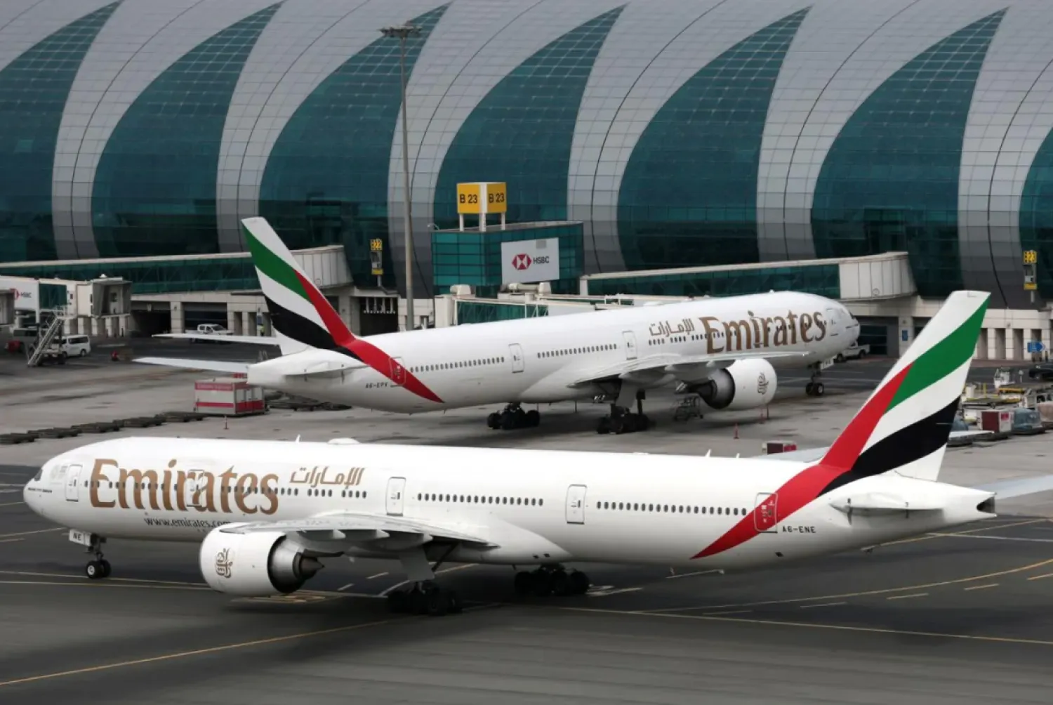FILE PHOTO - Emirates Airline Boeing 777-300ER planes are seen at Dubai International Airport in Dubai, United Arab Emirates February 15, 2019. REUTERS/Christopher Pike
