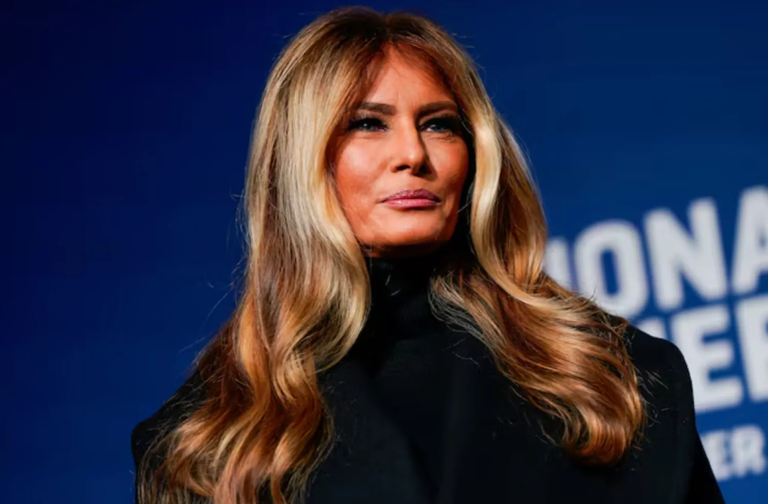 US first lady Melania Trump stands next to her 2025 inaugural gown in the Flag Hall of the Smithsonian's National Museum of American History in Washington, D.C., US, February 20, 2026. REUTERS/Elizabeth Frantz 