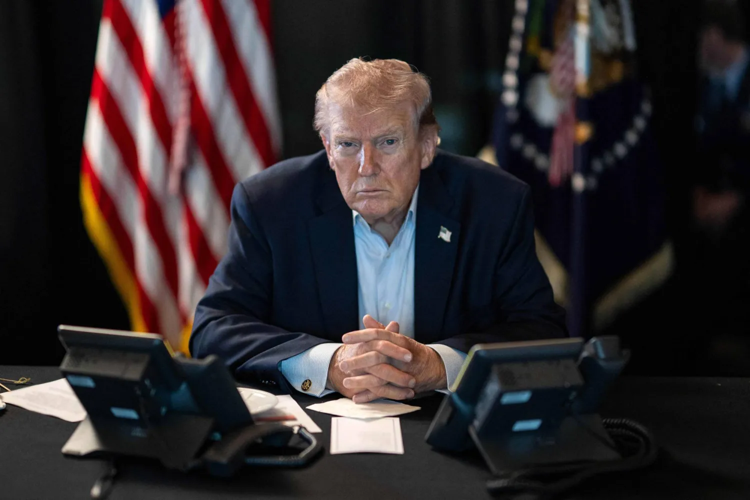 This official White House photograph taken on March 1, 2026 and released on March 2, 2026 on the White House X account shows US President Donald Trump overseeing "Operation Epic Fury" activity against Iran from Mar-a-Lago in Palm Beach, Florida. (Photo by Daniel TOROK / The White House / AFP) 