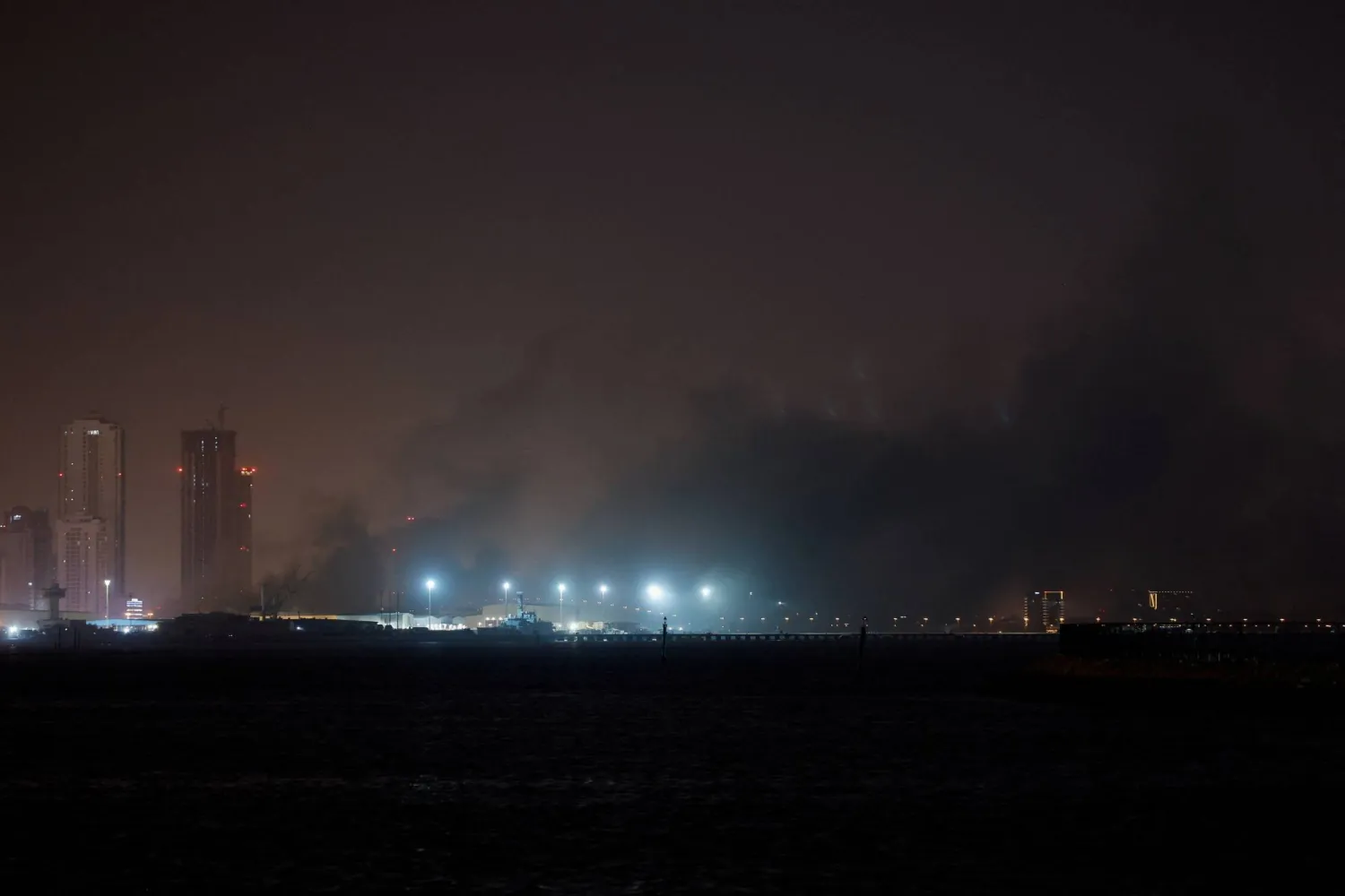 Smoke rises from US Navy Base after getting hit by an Iranian strike, in Juffair, Bahrain, March 1, 2026. REUTERS/Stringer