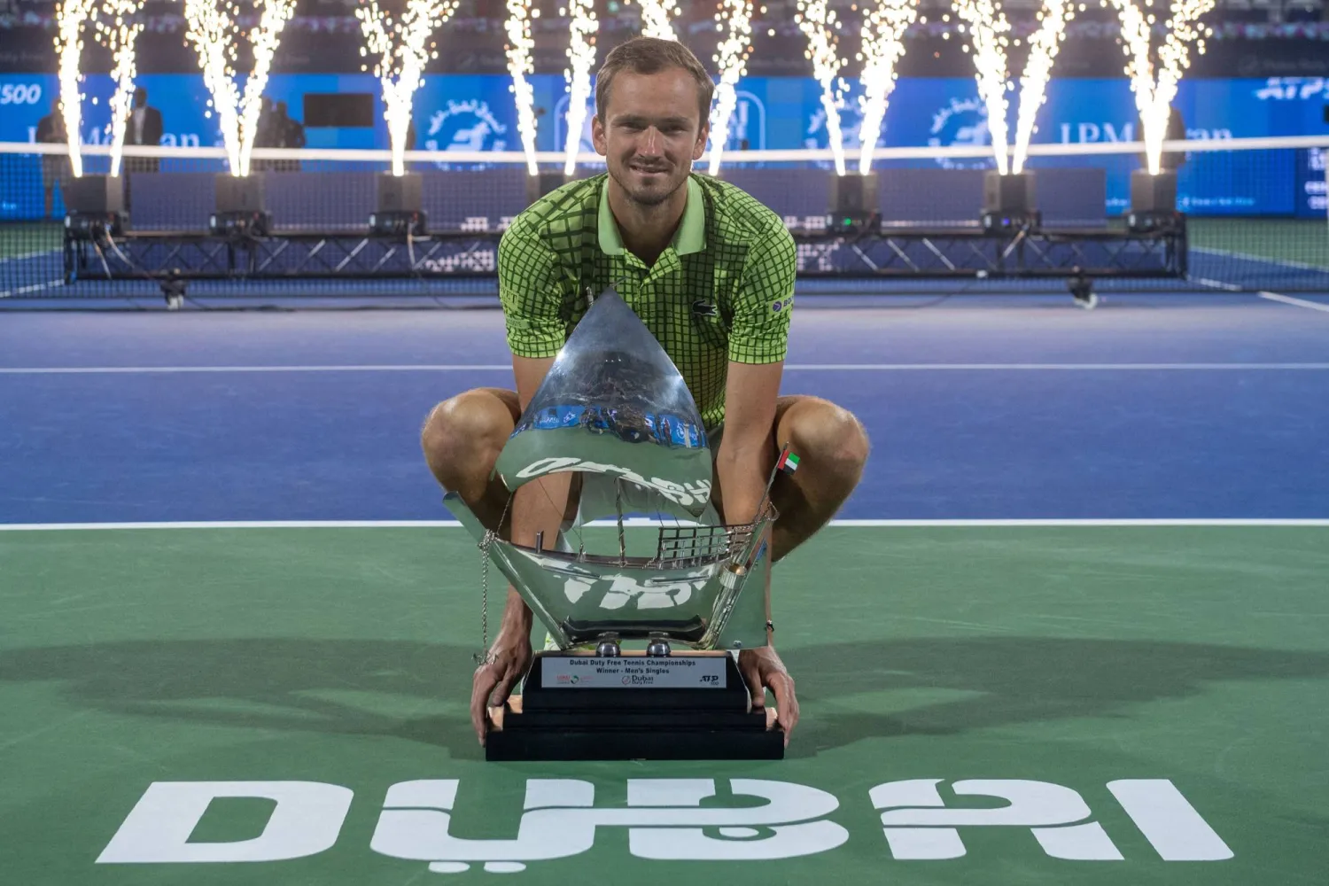 Russia's Daniil Medvedev poses with the trophy after winning his men's singles final match against Netherlands' Tallon Griekspoor at the Dubai Duty Free Tennis tournament in Dubai on February 28, 2026. (Photo by Ryan LIM / AFP)