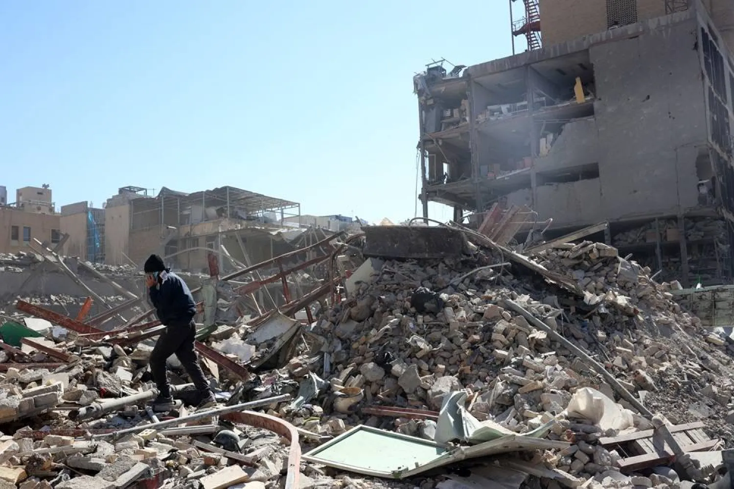 A view of a damaged building around Ferdowsi Square after an airstrike in central Tehran, Iran, 03 March 2026. (EPA)