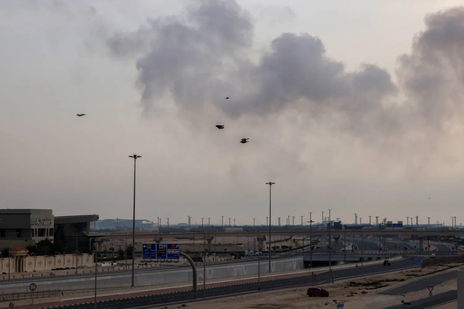 02 March 2026, Qatar, Doha: Smoke rise as Qatari air defenses intercepted Iranian missiles using the Patriot missile defense system over Doha. Photo: Stringer/dpa