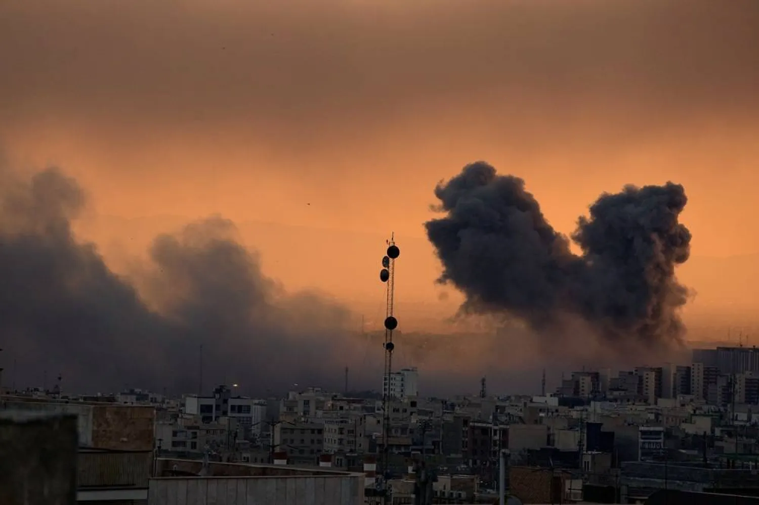  A plume of smoke rises following a US-Israeli military strike in Tehran, Iran, Tuesday, March 3, 2026. (AP) 