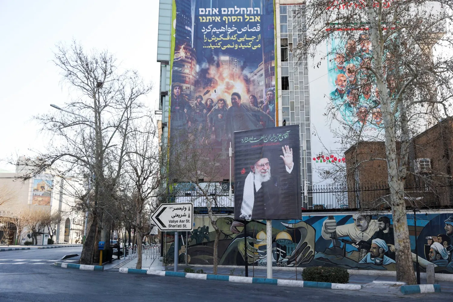 A sign in tribute to Iran's late Supreme Leader Ali Khamenei is displayed on a street, after he was killed in Israeli and US strikes on Saturday, in Tehran, Iran, March 4, 2026. Majid Asgaripour/WANA (West Asia News Agency) via Reuters)