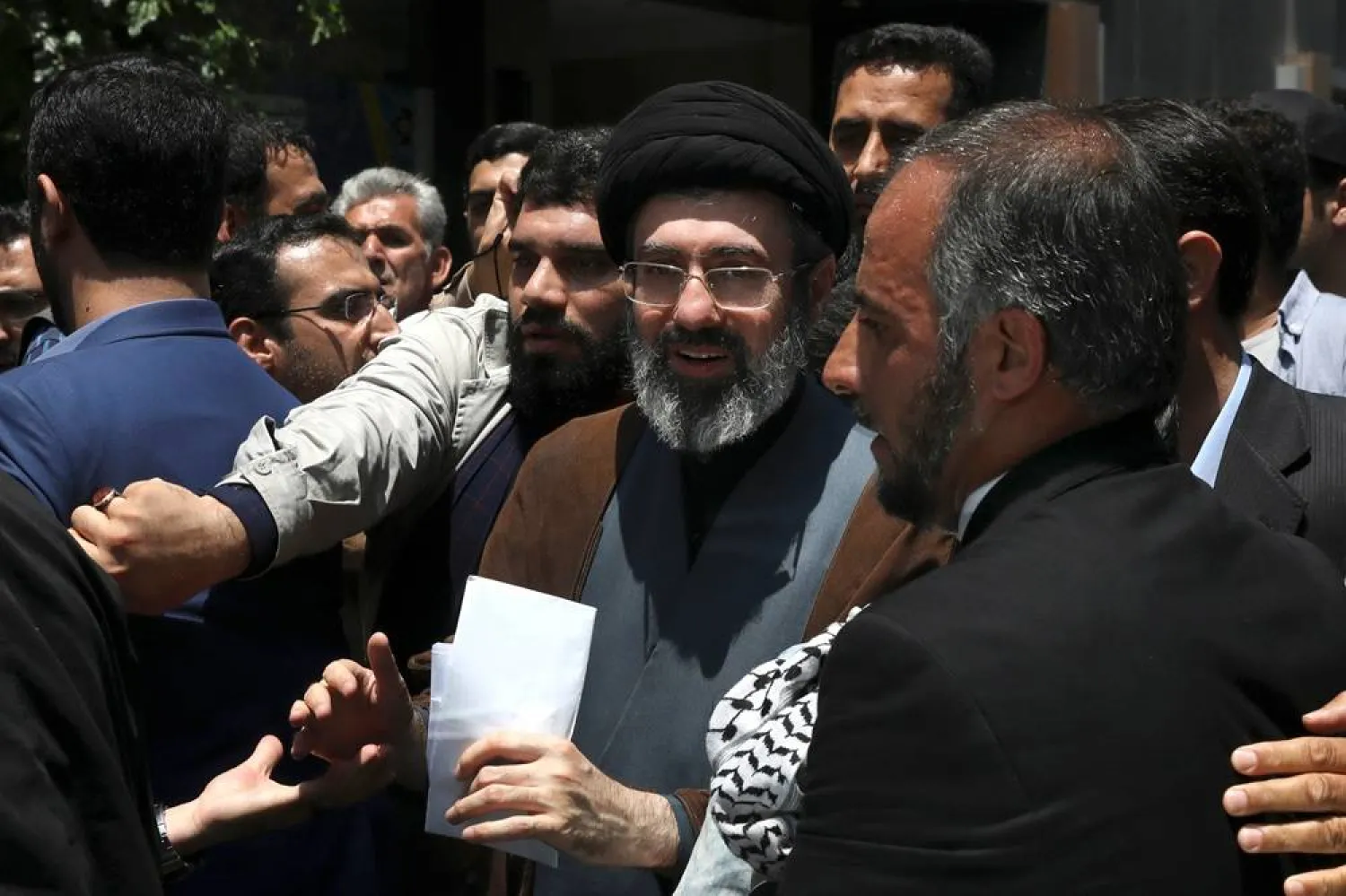 Mojtaba Khamenei, the son of Iranian Supreme Leader Ali Khamenei, center, attends the annual Quds, or Jerusalem Day rally in Tehran, Iran, on May 31, 2019. (AP)