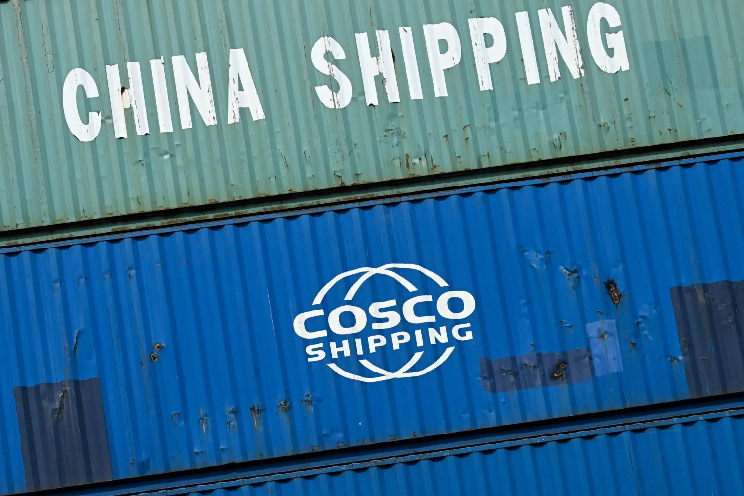 Containers of China Shipping and Cosco shipping companies are stacked at a transshipment station in Frankfurt am Main, western Germany, on April 15, 2025. (Photo by Kirill KUDRYAVTSEV / AFP)