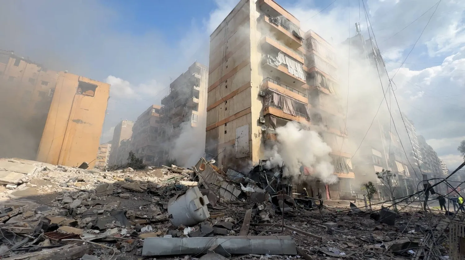 Smoke rises from a building damaged during strikes, following an escalation between Hezbollah and Israel, amid the US-Israeli conflict with Iran, in Beirut, Lebanon March 4, 2026, in this screengrab obtained from a social media video. Obtained By Reuters/via Reuters